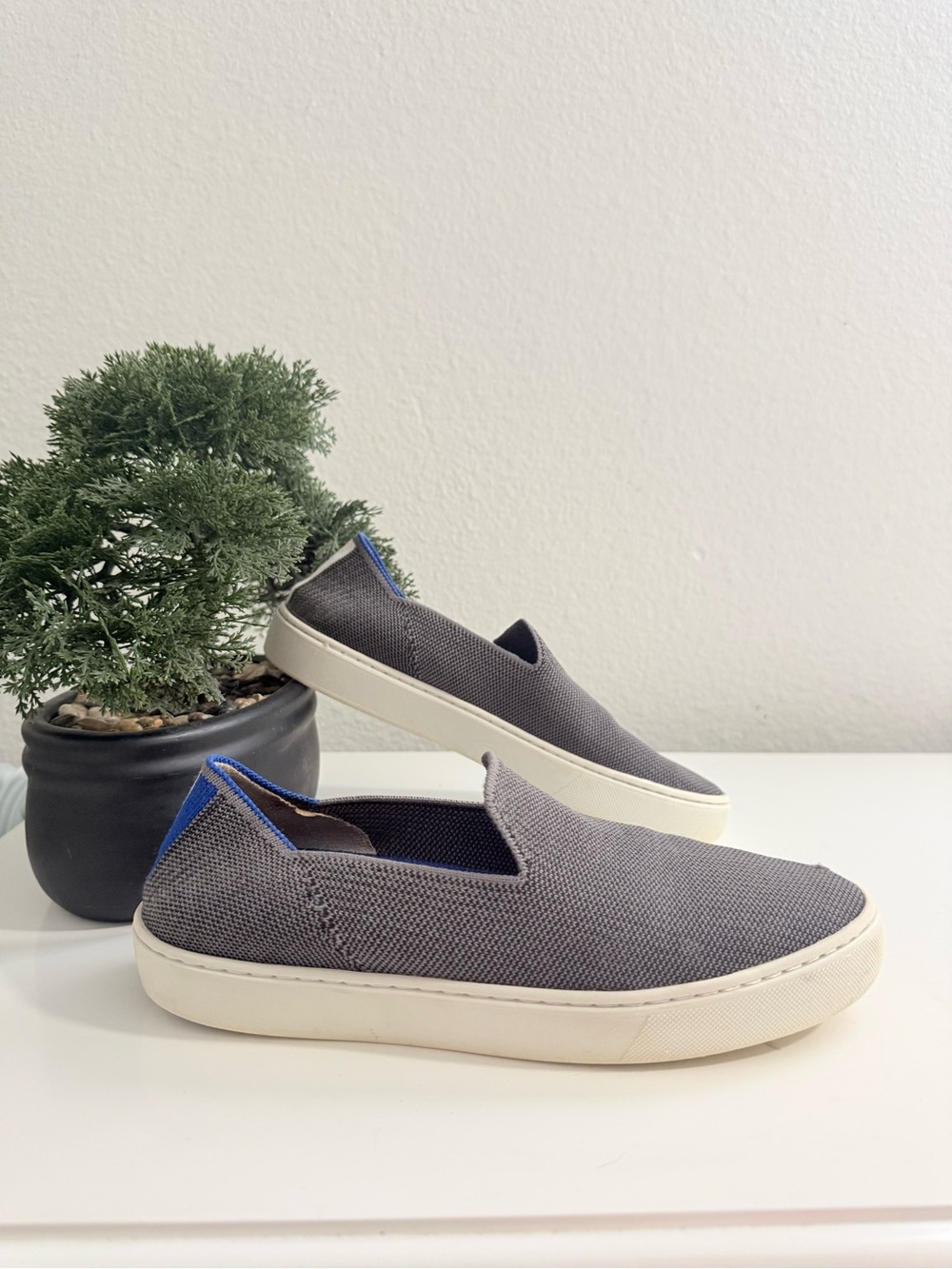 Rothy's sneakers women size 6.5 Gray Slip-On Sneakers with Blue Heel Accent